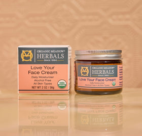 Indian Meadow Herbals hand applying cream demonstrating smooth spread and hydration