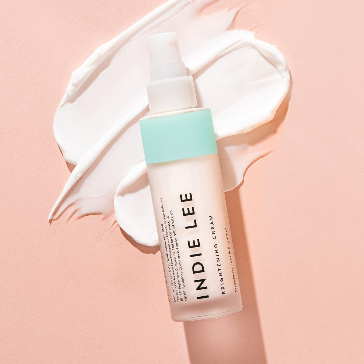 Indie Lee cream texture swirl illustrating lightweight, hydrating finish