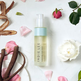 Indie Lee foamy cleanser texture close-up demonstrating gentle lather