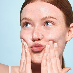Indie Lee applied as mask on skin highlighting gentle exfoliating benefit