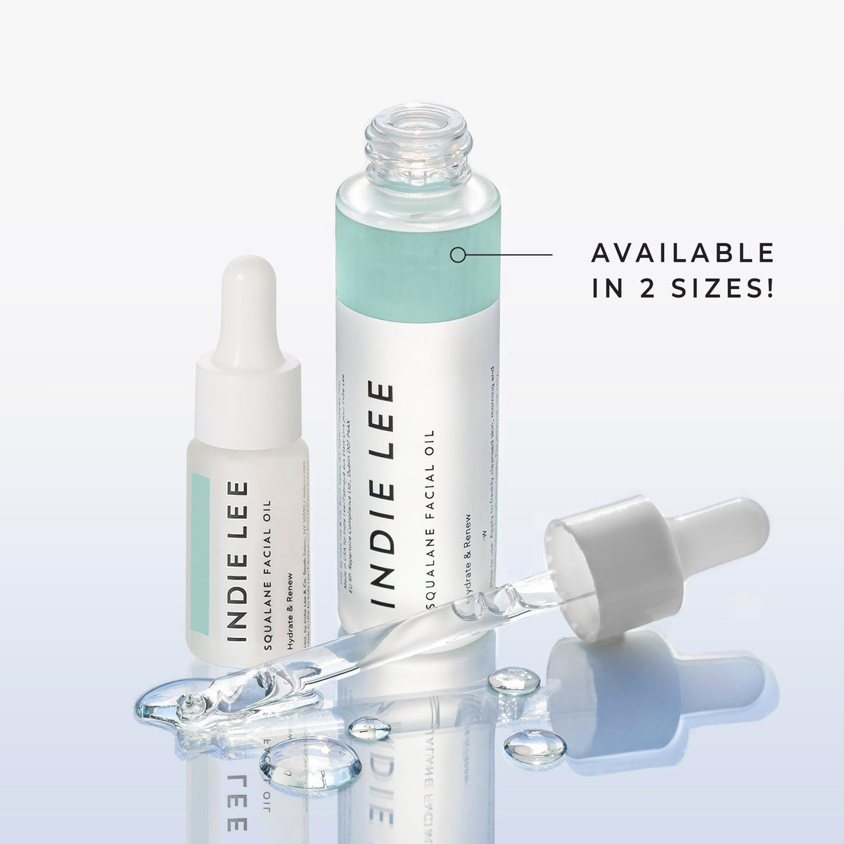 Indie Lee applying a few drops on hand to show moisturized, smooth skin