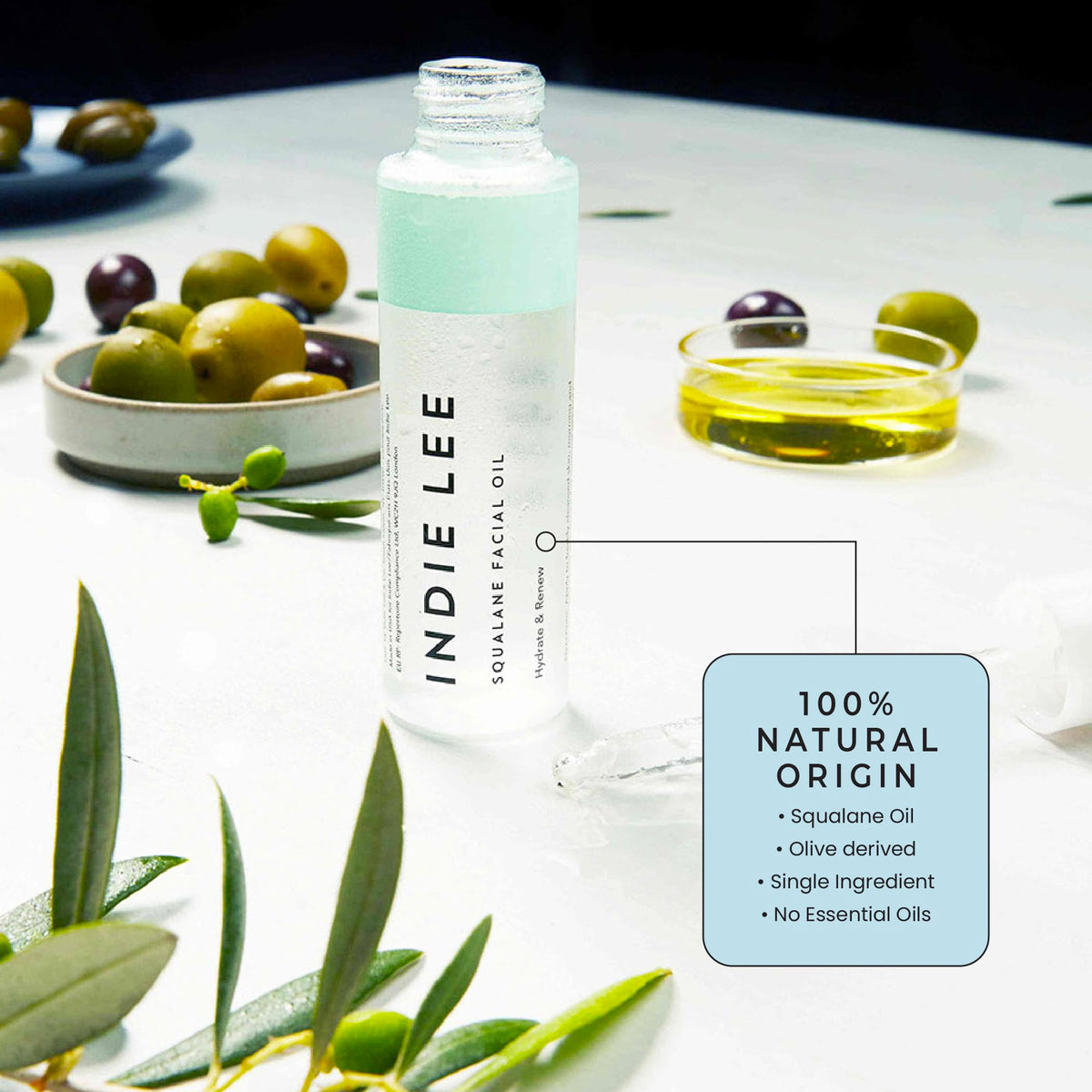 Indie Lee dropper detail dispensing squalane for precise, mess-free use
