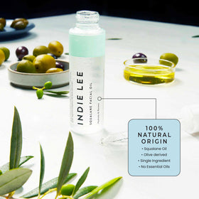 Indie Lee dropper detail dispensing squalane for precise, mess-free use