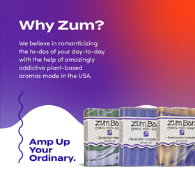 Indigo Wild Zum bar beside a hand demonstrating 3 oz size and portability