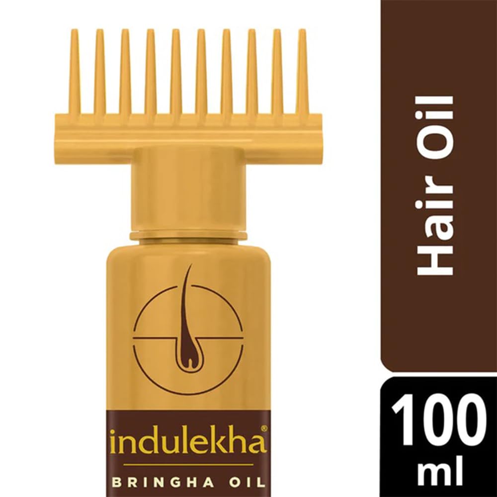 INDULEKHA close-up of nozzle and comb showing ease of application
