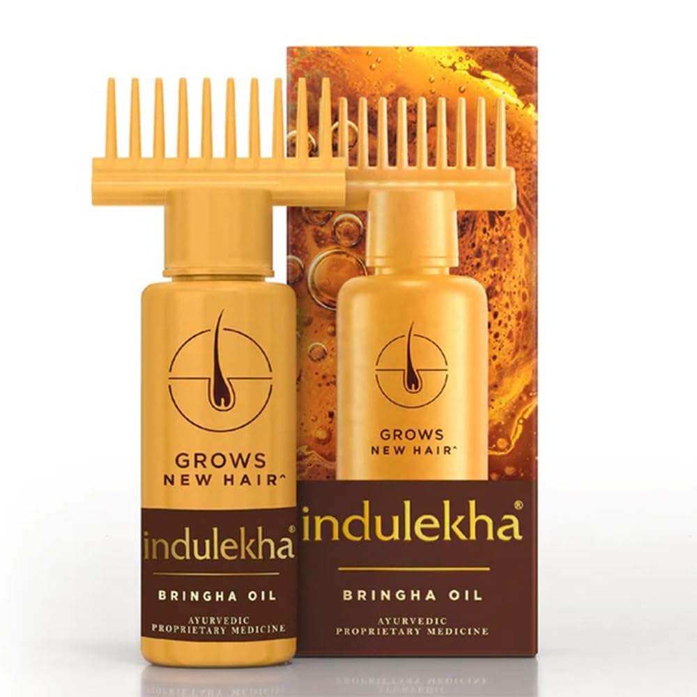 INDULEKHA comb applicator attachment delivering oil precisely to scalp