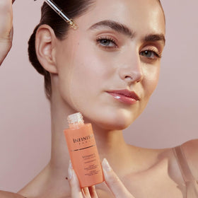 Infinitek Paris serum texture close-up, silky hydration and smooth finish