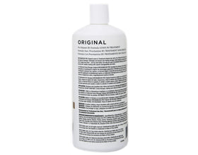INFUSIUM 23 bottle next to ruler demonstrating 33.8 oz scale and economical supply benefit