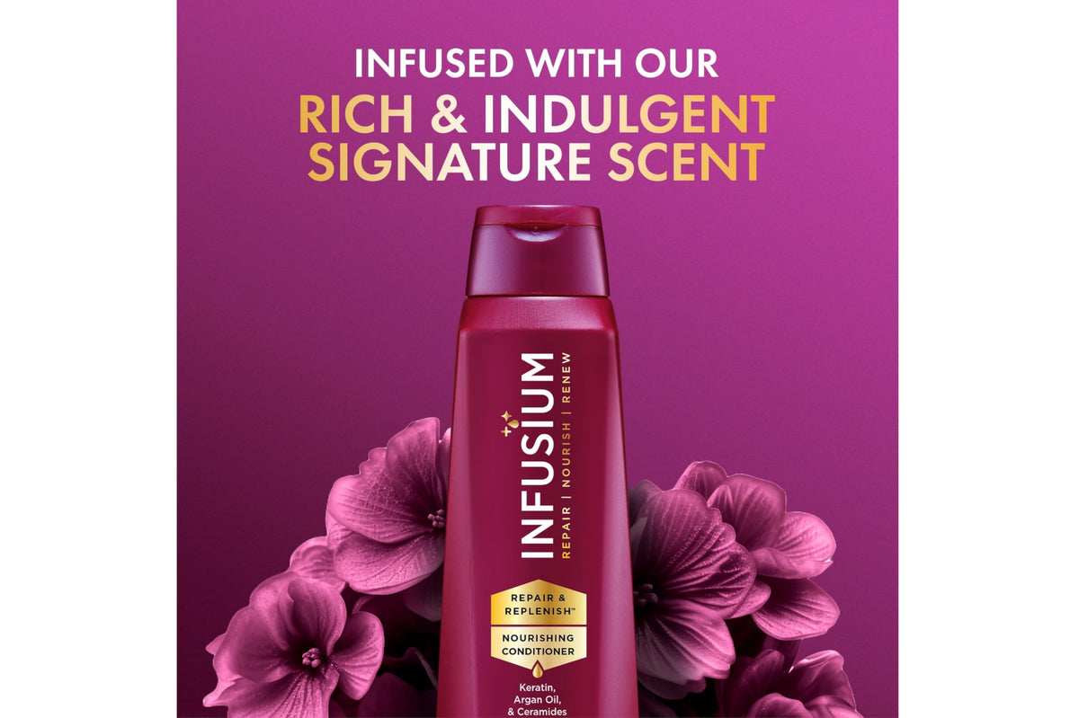 Infusium shampoo pump dispensing clear lather to show gentle cleansing benefit