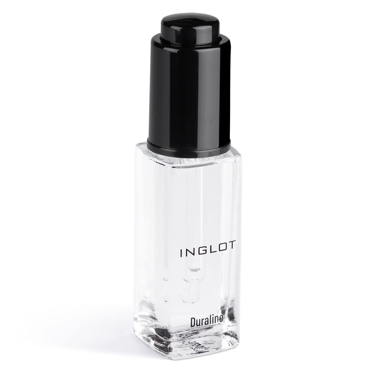 Inglot products next to coin showing compact travel-friendly size