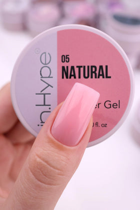 IN.HYPE gel being applied by nail tech for strong extensions and controlled shaping