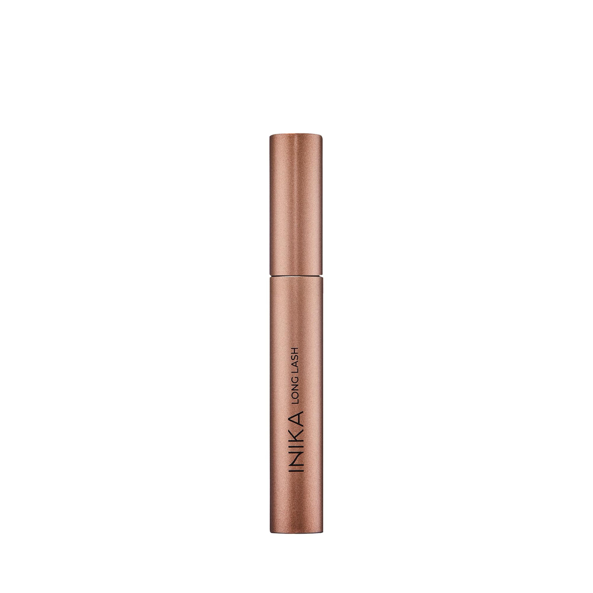 INIKA long lash scale comparison with coin indicating compact size and travel-friendly benefit