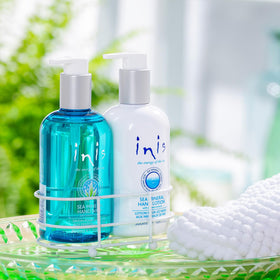 Inis brand hand wash bottle close-up showing pump top and gentle cleansing benefit