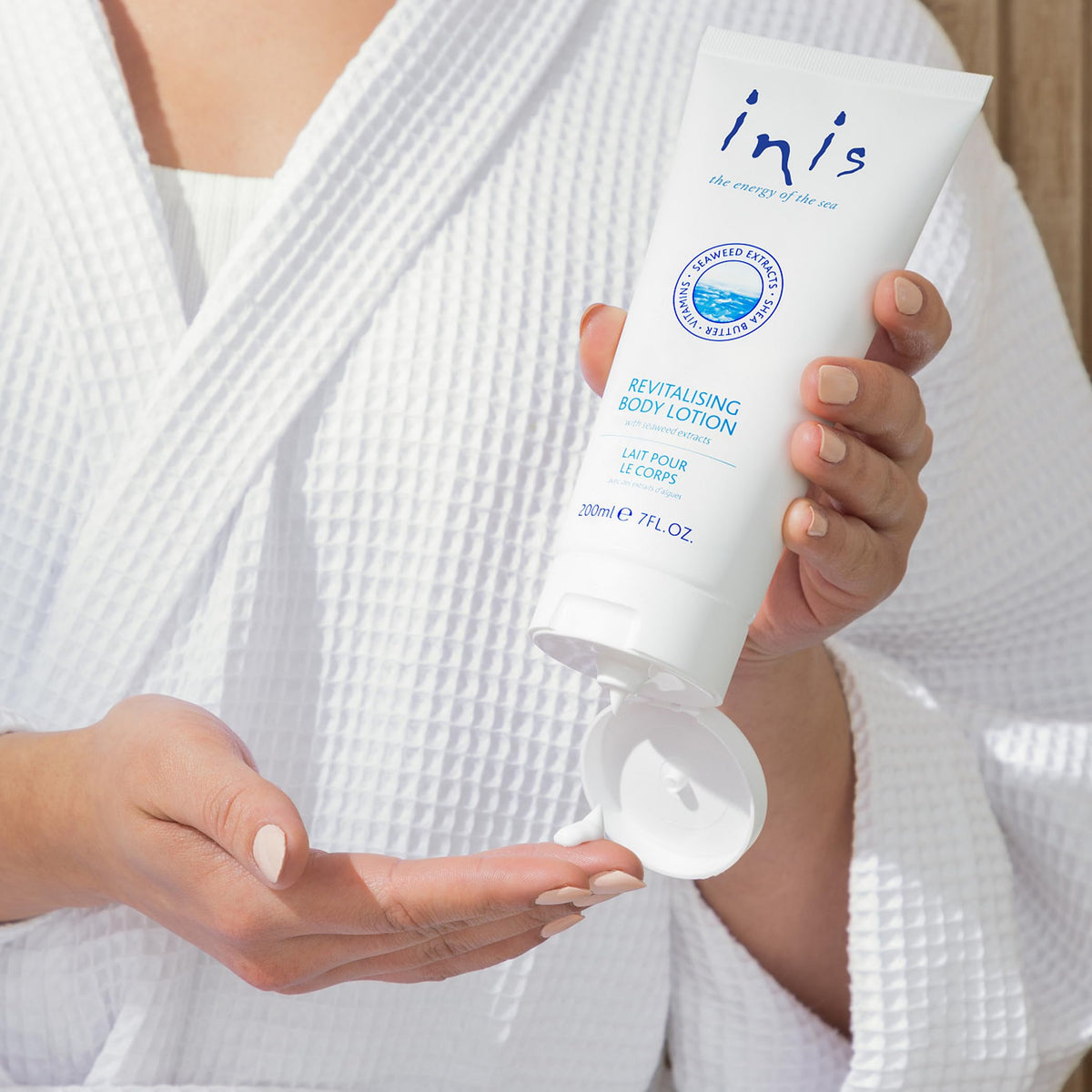 Inis lotion on bathroom shelf staged to show daily routine and freshness