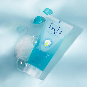 Inis the Energy of the Sea bottle in a shower scene showing everyday use and refreshing scent