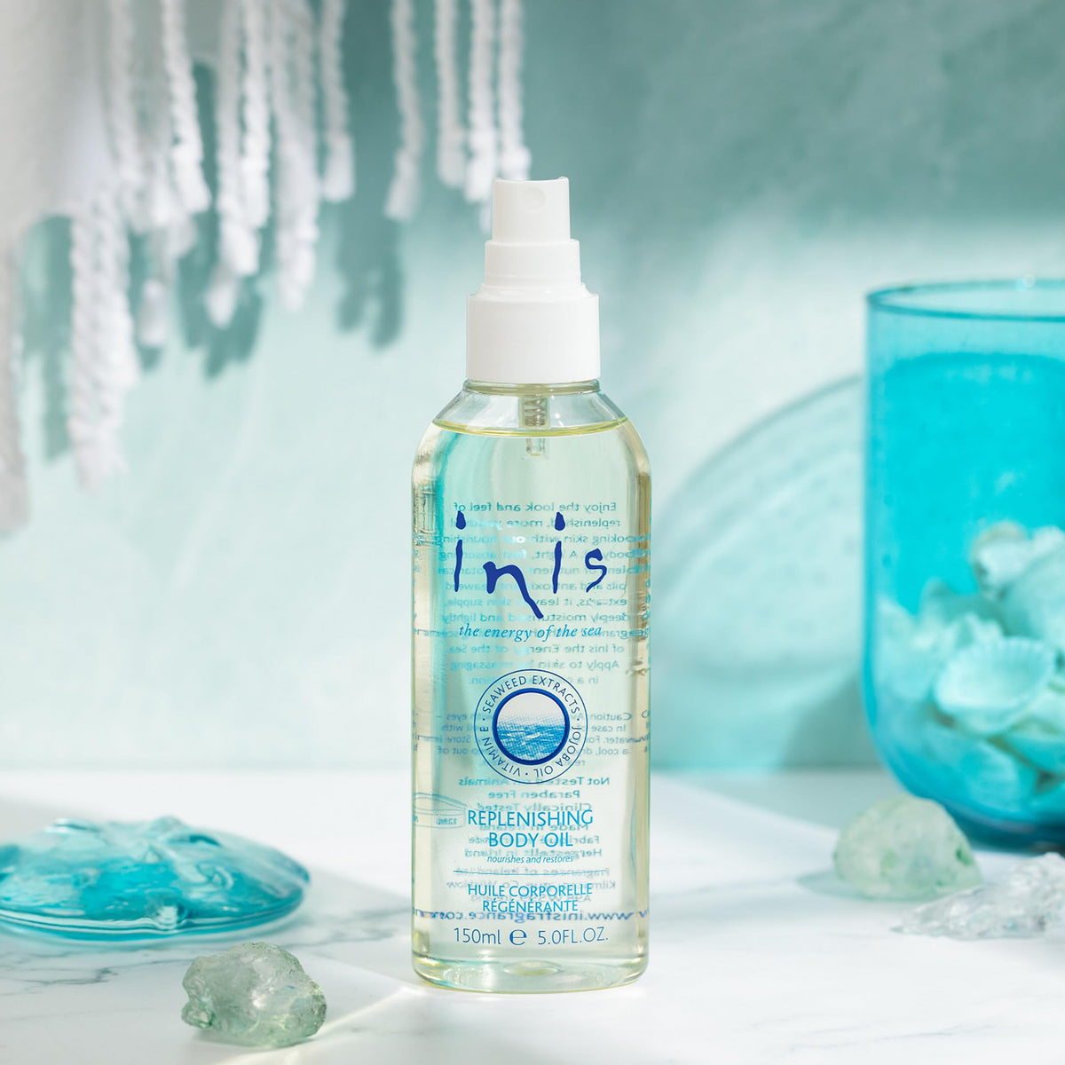 Inis spray mist detail demonstrating fine mist and quick absorption benefit