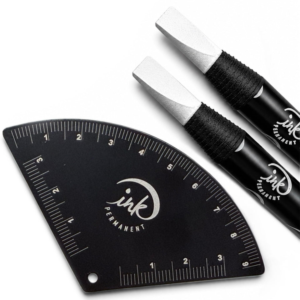 Ink Permanent front view of the black aluminum ruler and two white pencils showing professional kit benefit