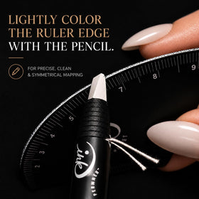 Ink Permanent ruler next to hand illustrating compact size for travel-friendly portability