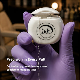 Ink Permanent mapping string in use on eyebrow to create visible, accurate guide lines