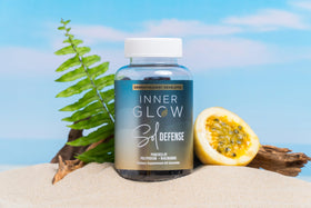 Inner Glow gummies in a beach pouch conveying travel and outdoor routine benefit