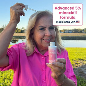 Innerbloom dropper close-up highlighting precise scalp application