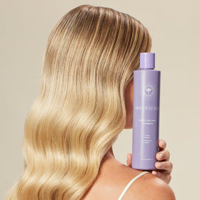 INNERSENSE bottle being poured to show product color and lightweight consistency