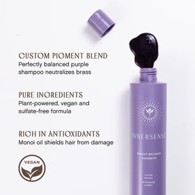 INNERSENSE bottle in hand showing 10 fl oz size for clarity
