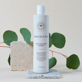 INNERSENSE lifestyle shot woman with glossy colored hair showing vibrant shine