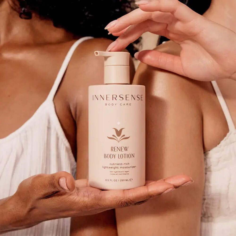 INNERSENSE Renew lotion staged in bathroom setting portraying daily ritual use
