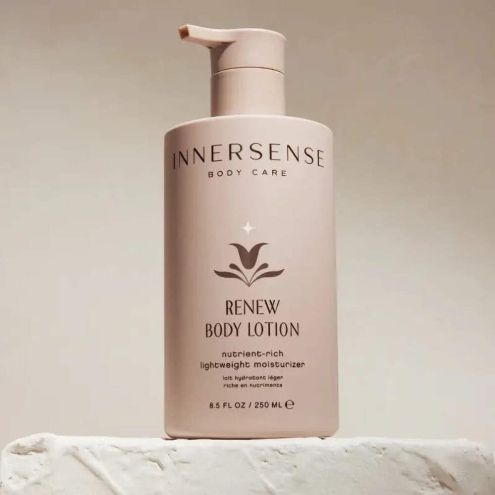 INNERSENSE applying Renew lotion to forearm demonstrating quick, non-greasy absorption