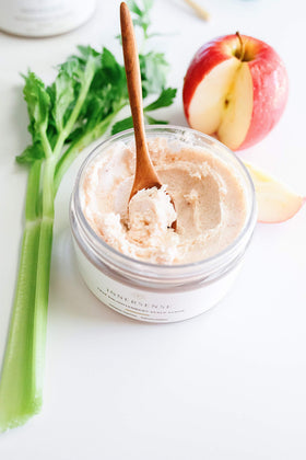 INNERSENSE applying scrub to wet scalp demonstrating pre-cleanse benefit