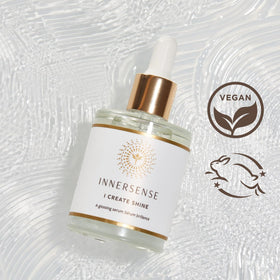 INNERSENSE oil texture drop on fingers showing lightweight, non-greasy absorption