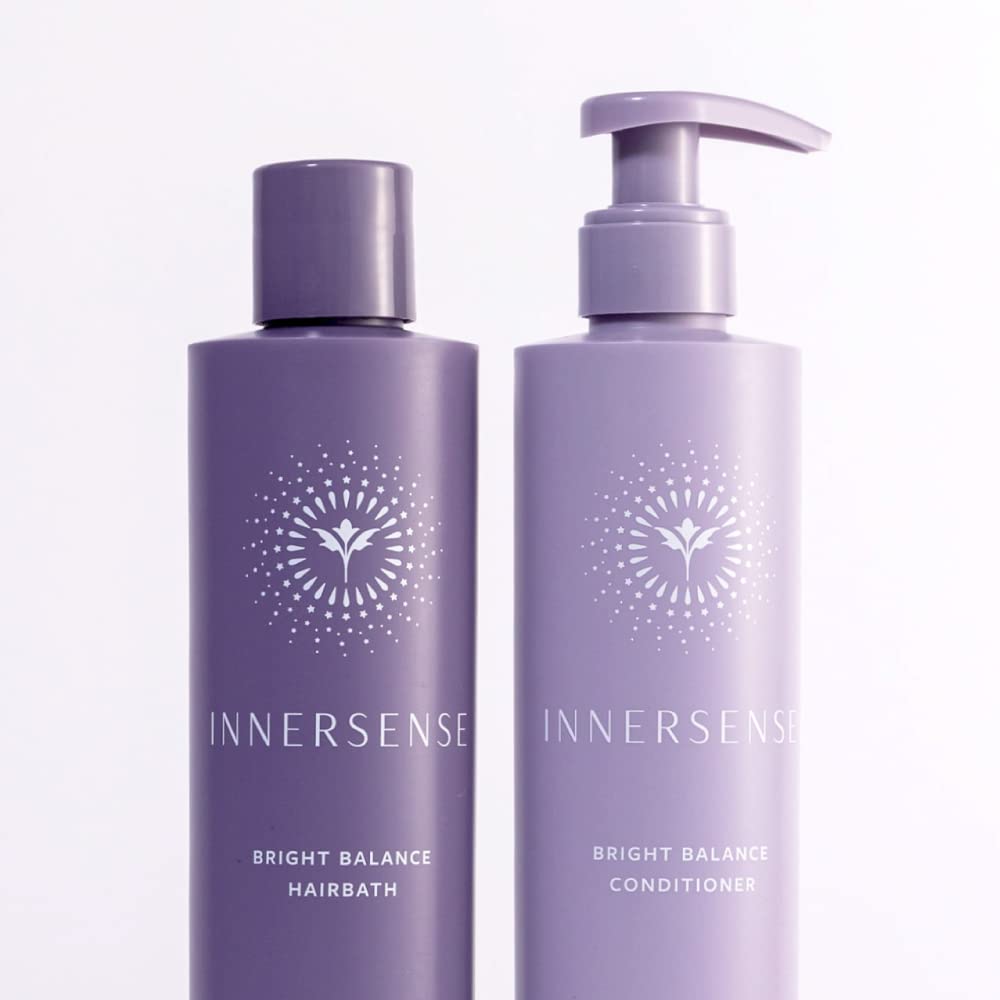 INNERSENSE shampoo being poured to show purple hue and gentle cleanse benefit
