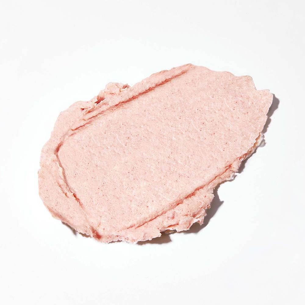 INNERSENSE close-up texture of red salt granules showing gentle exfoliation