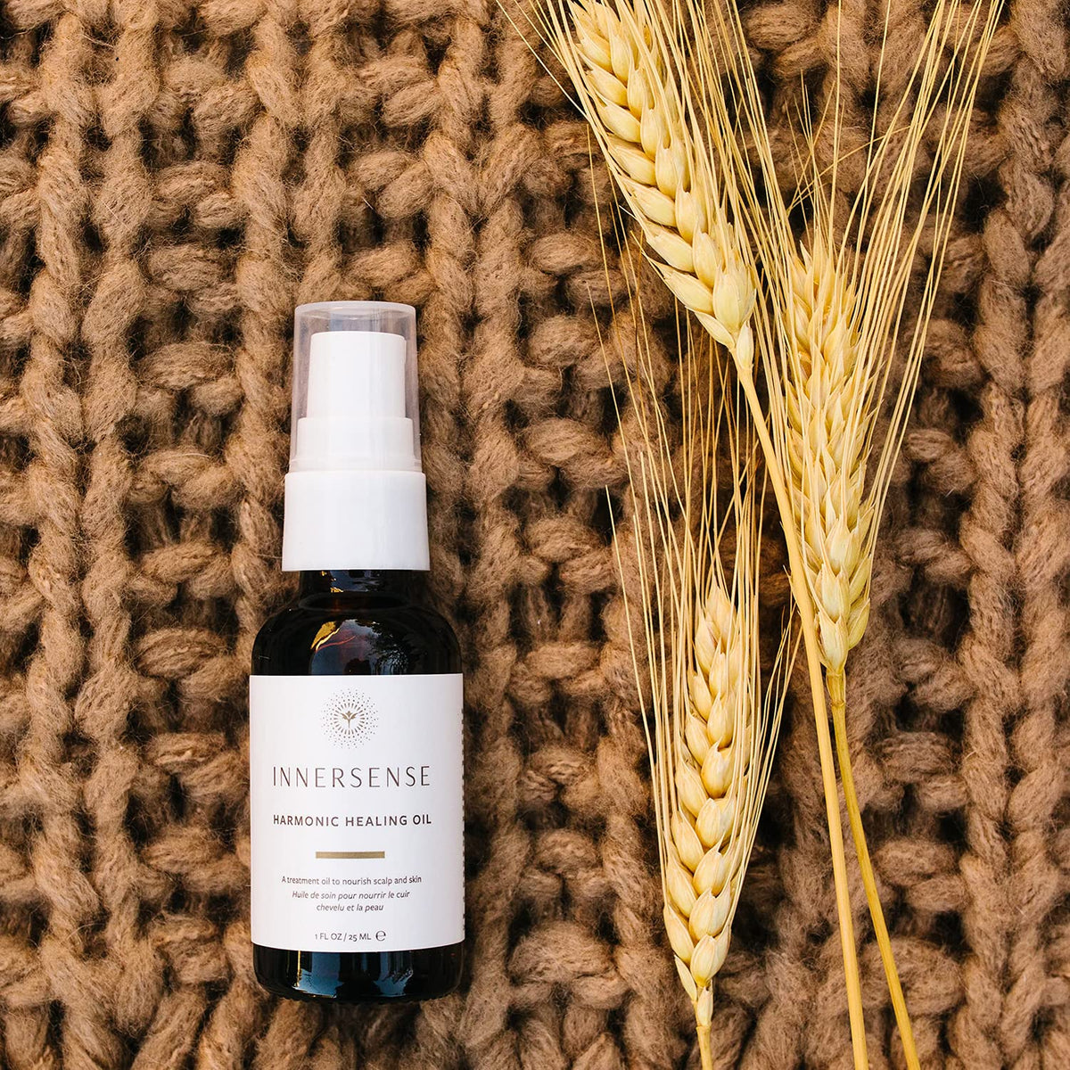 INNERSENSE treatment oil applied to hair demonstrating scalp and end nourishment