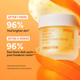 hand holding both innisfree serum and mini cream showing size scale for travel convenience