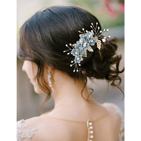 inSowni close-up of dusty blue fabric flower highlighting layered petals and elegance