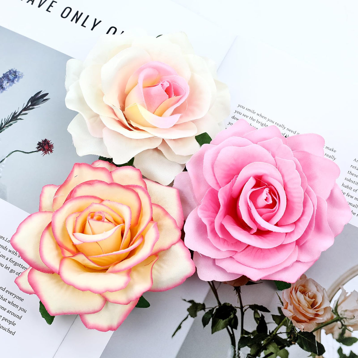 inSowni multiple roses in an updo creating layered, romantic hair styling