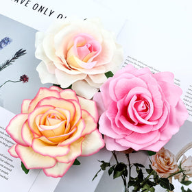inSowni multiple roses in an updo creating layered, romantic hair styling