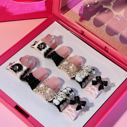 IntoVibes front packaging showing black ballet ribbon design and quick salon look