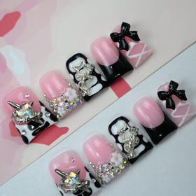 IntoVibes nails in hand showing small-size scale and comfortable everyday length