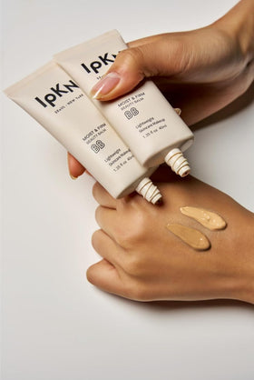 IPKN 40ml bottle next to common item showing compact size and travel convenience