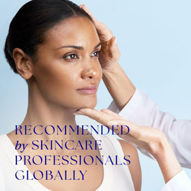 iS CLINICAL mist applied over makeup demonstrating setting and radiance benefit
