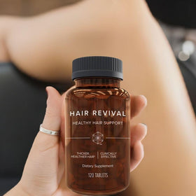 Isagenix lifestyle image of woman brushing hair showing smoother-looking results