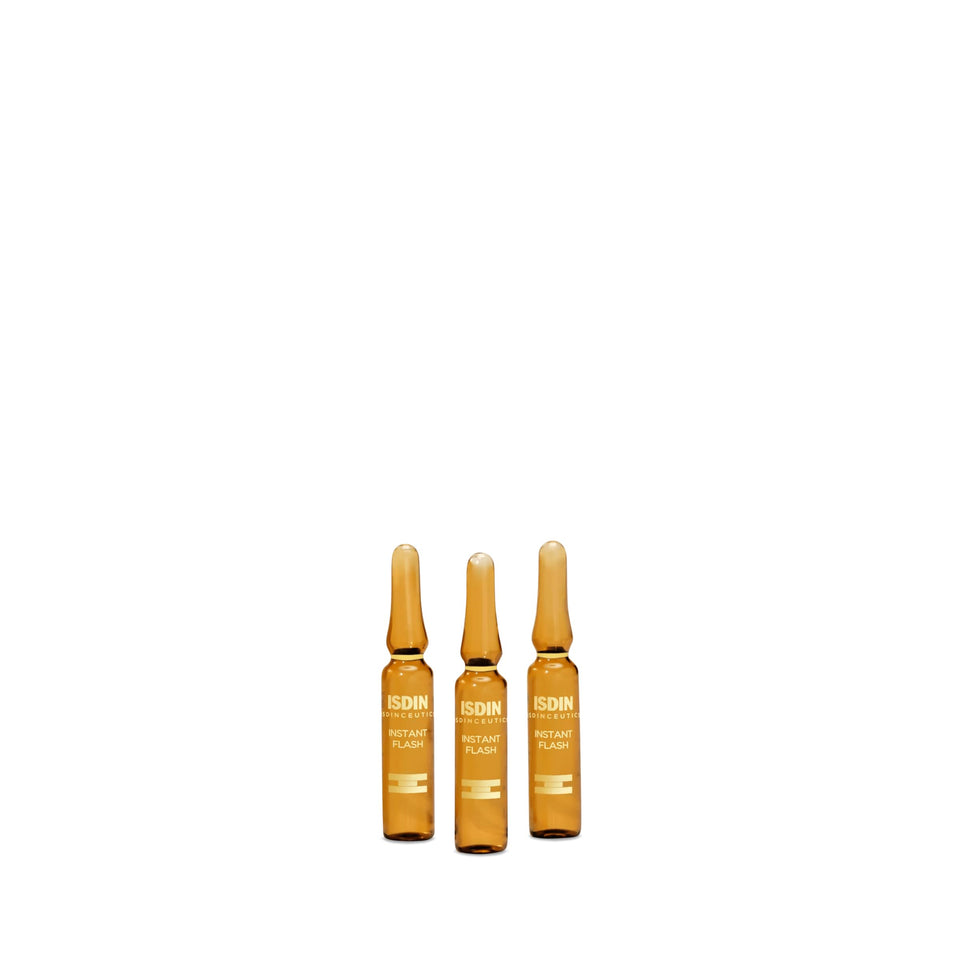 ISDIN ampoules front packaging showing five travel-size vials and brand benefit