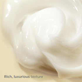 ISDIN open jar with cream swirl highlighting nourishing, non-greasy finish