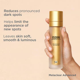 ISDIN Melaclear 1.7 fl oz bottle held for size comparison and scale
