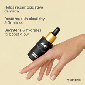 ISDIN Melatonik ingredient highlight melatonin bottle and powder showing restorative actives benefit: nighttime repair