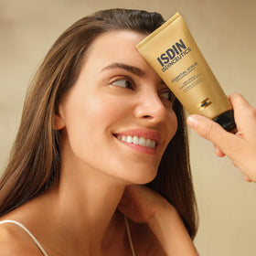 ISDIN olive seed particle closeup revealing gentle exfoliant texture and purity