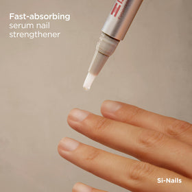 ISDIN Si-Nails bottle with brush applicator demonstrating precise application benefit